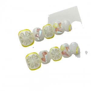 Handmade summer lemon press-on nails with 3D fruit designs and sparkling rhinestones