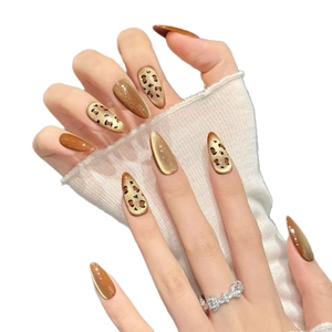 Short almond press-on nails with brown leopard print and glitter cat-eye finish