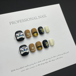 Handmade Chinese Lion Dance press-on nails with 3D embossed designs and matte finish