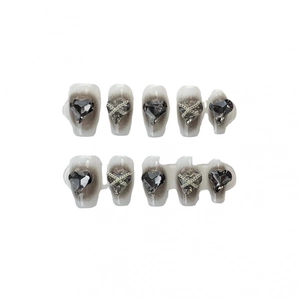 Handmade press-on nails with white gradient, dark heart rhinestones and silver chains
