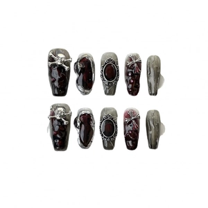 Gothic punk press-on nails with silver skull and cross 3D charms in dark red ombré