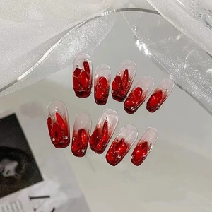Glossy red gradient press-on nails with 3D relief texture and rhinestones for brides