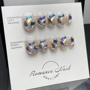 Handmade press-on nails with aurora glitter, 3D heart sequins, and jelly gradient finish