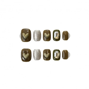 Handmade coffee-brown press-on nails with olive green accents and heart glitter details