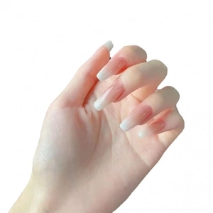 Glossy long coffin press-on nails with natural nude to white ombre French gradient