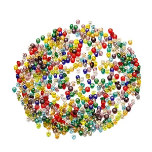 Overhead view of colorful 2mm glass seed beads for DIY jewelry and clothing decoration