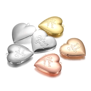 Macro detail of heart-shaped copper locket pendants with I Love You engraving