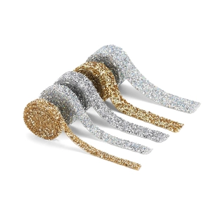Close-up of gold and silver self-adhesive rhinestone ribbons for DIY fashion crafts