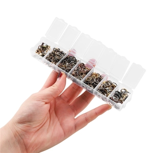 DIY jewelry making kit with multi-color jump rings and lobster clasps in a 7-grid box