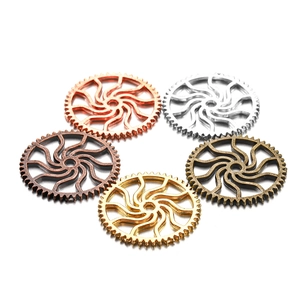 Detailed view of assorted metal steampunk gears in five metallic finishes for DIY jewelry