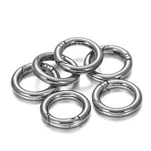 Detail of gunmetal spring O-rings showing metallic finish and snap gate mechanism