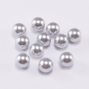 Macro shot of silver grey round seamless ABS faux pearls for DIY jewelry making