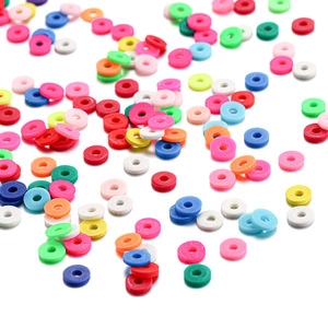 Flat round heishi clay beads in vibrant rainbow colors for DIY jewelry making