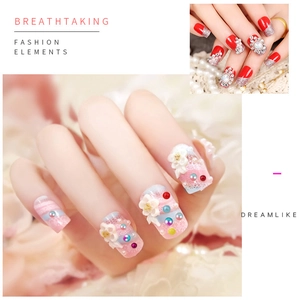 Pink blue dreamy lace press-on nails with 3D flowers and red silver rhinestone design