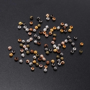 Mix di perline rotonde in metallo con foro centrale per creazione di gioielli fai da te