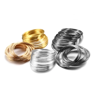 Detail of multi-color DIY memory steel wire coils in gold, silver, rose gold and black