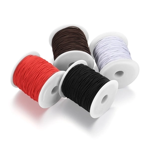 Elastic cord set for jewelry with four spools of red, coffee, black, and white threads