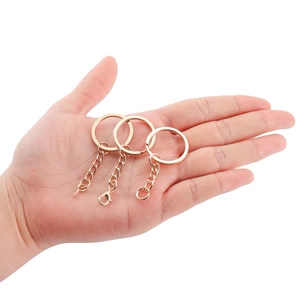 Three rose gold metal keychains with chains and lobster clasps for DIY jewelry making