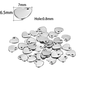 Macro detail of heart-shaped stainless steel charms with 7mm x 6.5mm dimensions