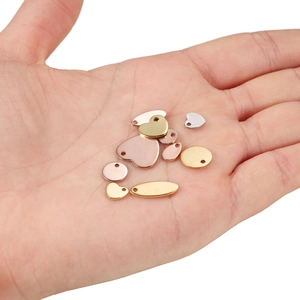 Polished stainless steel DIY pendants in heart, round, and oval shapes for jewelry making