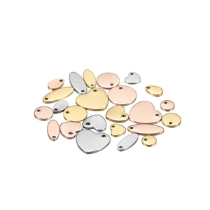 Polished stainless steel charms in heart, circle, and oval shapes for DIY jewelry making