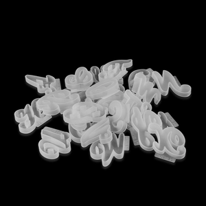 Macro shot of 26 lowercase alphabet silicone molds for DIY resin jewelry making