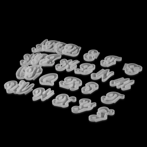 Detailed view of 26 lowercase cursive alphabet silicone molds for DIY resin jewelry and pendants