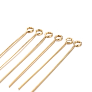 Golden stainless steel eye pins for DIY jewelry making with smooth metallic finish