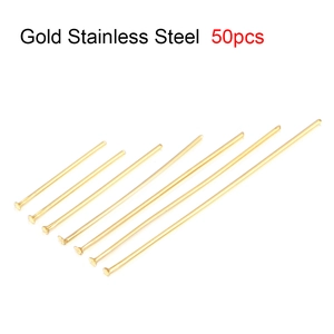 Close-up of golden stainless steel T-pins for jewelry making in various lengths