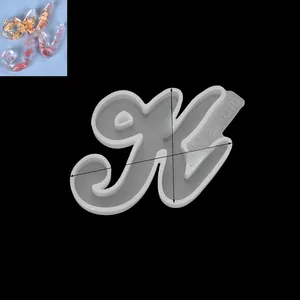 Detailed view of cursive K silicone mold with dimensions 6x4.3cm for resin DIY crafts