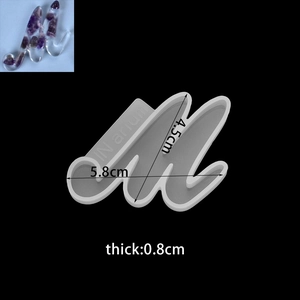 Detailed view of lowercase letter M silicone mold for DIY resin jewelry making