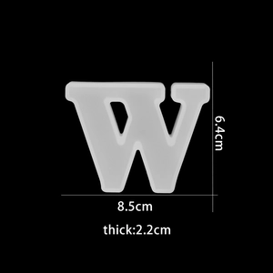 Detailed view of translucent letter W silicone mold with size dimensions 8.5x6.4x2.2cm
