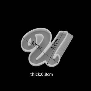 Macro detail of lowercase alphabet silicone mold showing 4.9cm by 4.2cm dimensions