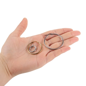Polished gold and silver stainless steel hoop earrings in three various sizes