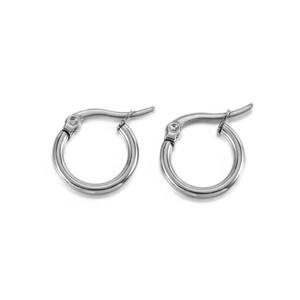 Close-up of polished silver hoop earrings with secure click-top closure for DIY jewelry