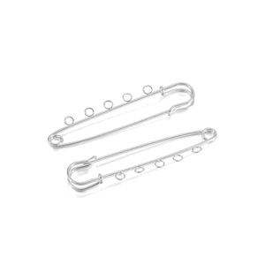 Close-up of two polished silver metal safety pins with five loops for DIY jewelry making