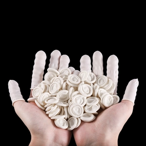 Macro shot of white latex finger cots showing textured tips and high elasticity for grip