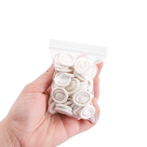 White anti-static disposable latex finger cots in a transparent bag for hand protection