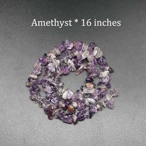 Close-up of 16-inch natural irregular amethyst stone chips for DIY jewelry making
