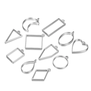 Silver geometric metal pendant frames set for DIY jewelry making with reflective background