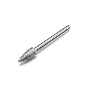 Macro detail of a silver conical metal nail drill bit with fine abrasive grain coating
