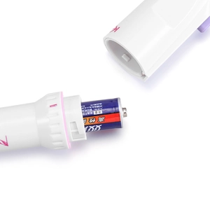 Portable white electric nail drill for manicure with AA battery powered compartment