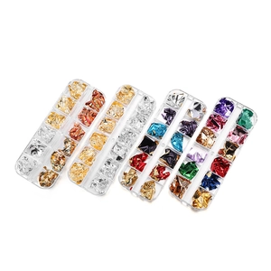 Detailed set of 48 colors of metallic foil flakes in plastic boxes for DIY crafts