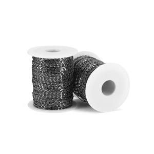 Detailed view of two spools of 1.6mm gunmetal curb chains for DIY jewelry making