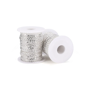 Detailed view of two rolls of 1.6mm silver plated flat link chain for DIY jewelry making