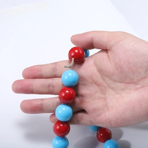 Natural jute rope with large red and light blue glossy beads for DIY home garden decor