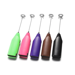 Five handheld electric milk frothers in neon green, pink, purple, brown, and black colors