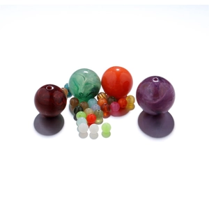 Mix of colorful acrylic beads in marble and solid textures for DIY jewelry crafting
