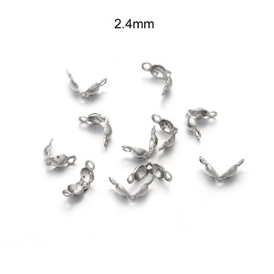 Vue détaillée de perles à écraser en métal argenté de 2,4mm pour bijoux DIY