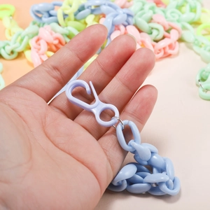 Close-up of colorful 11mm acrylic link chain with matching plastic hook in macaron blue
